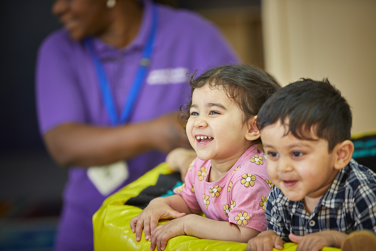 Boy and Girl in Ball Pit 